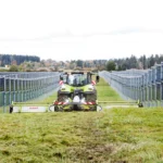 Dual-use agricultural photovoltaic panels installed on farmland in Europe, showcasing renewable energy and farming integration in Italy, France, and Spain.